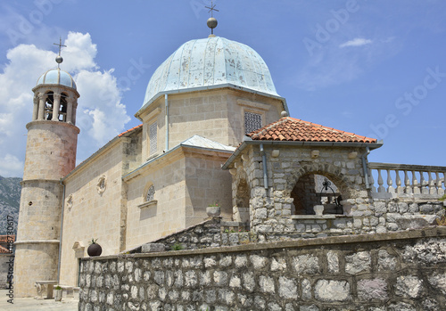 The Our Lady of the Rock island in Kotor Bay, Montenegro. The island was artificially created and includes a small Roman Catholic church. 