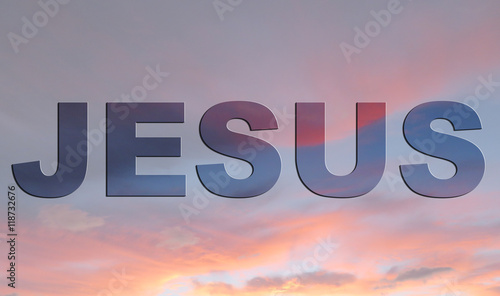 Jesus word superimposed on beautiful sunrise clouds