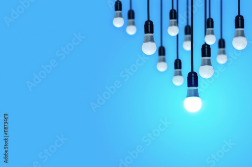 Light bulbs on a blue background. Concept of "have an idea"