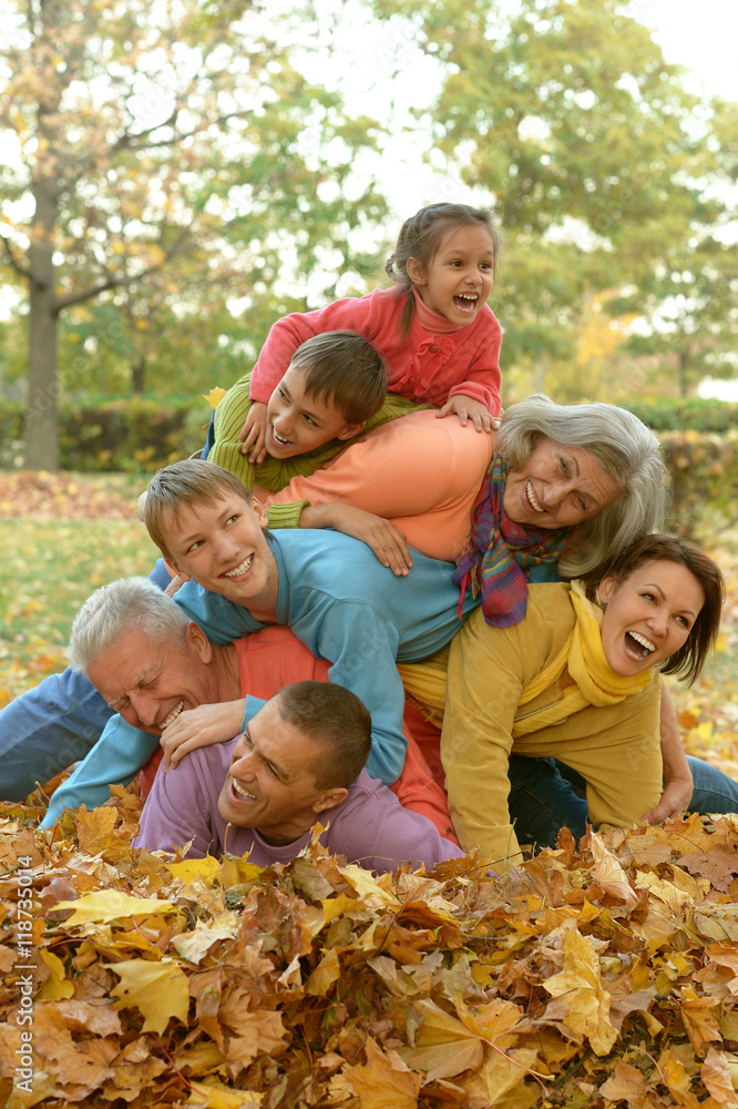 Fototapeta premium Happy family in autumn forest