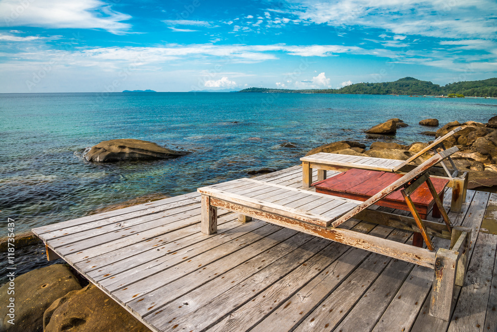 Fototapeta Beautiful tropical island beach with daybed - Travel summer holiday vacation concept