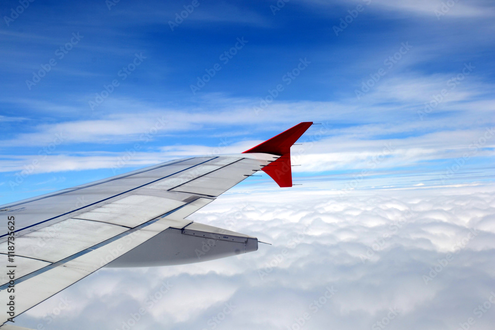 window of jet plane with blue sky and city view window of jet plane with blue sky and city view