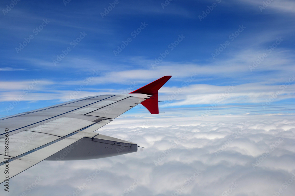 window of jet plane with blue sky and city view window of jet plane with blue sky and city view