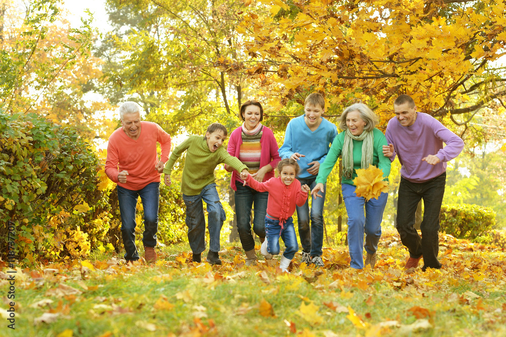 Happy family in autumn forest Happy family in autumn forest