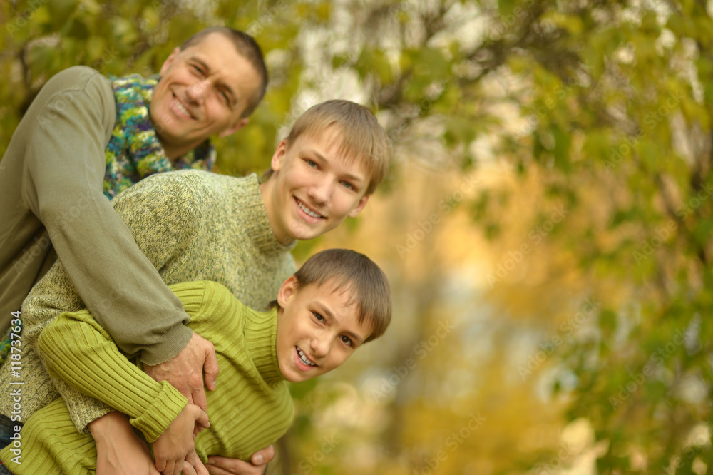 Family relaxing in autumn park Family relaxing in autumn park