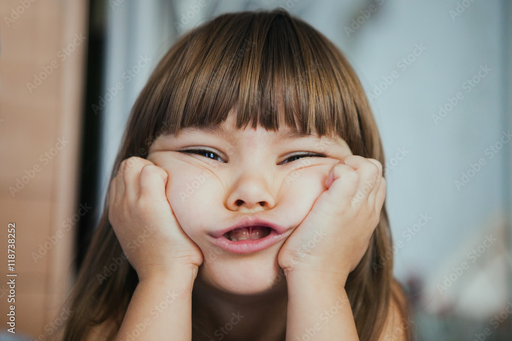 Premium Photo  Child girl sad profile face close up with hands on cheek.