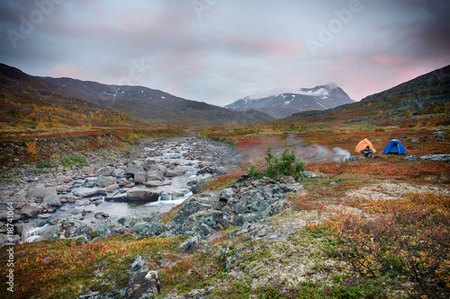 Tent and Waterfall on the Nordkalottleden Hiking Trail in Lapland - Sweden photo