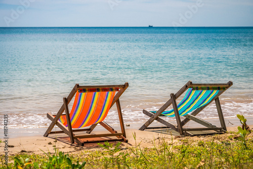 Colorful beach chair on beautiful tropical island beach summer holiday - Travel vacation concept.