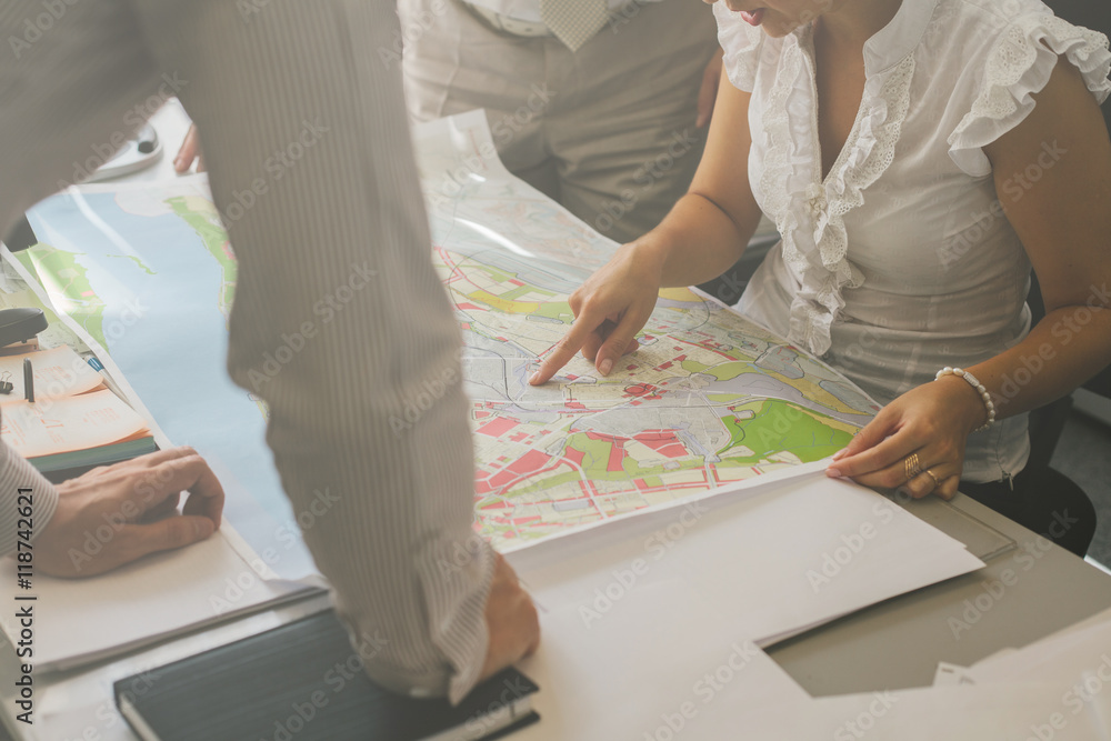 Office. Teamwork in the field of project development, building construction and urban development. Architects. Professionals. People at work. Office. Teamwork in the field of project development, building construction and urban development. Architects. Professionals. People at work.