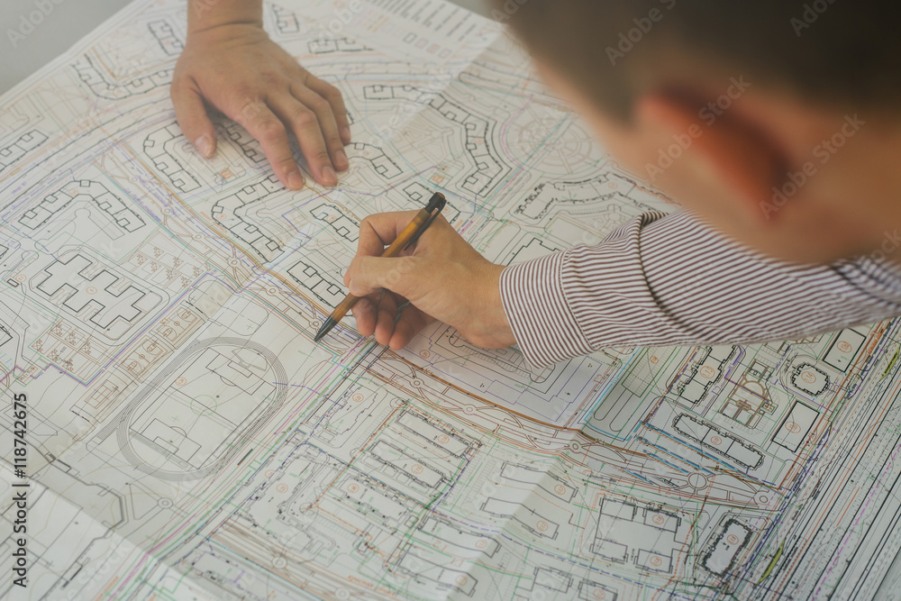 Office. Teamwork in the field of project development, building construction and urban development. Architects. Professionals. People at work. Office. Teamwork in the field of project development, building construction and urban development. Architects. Professionals. People at work.