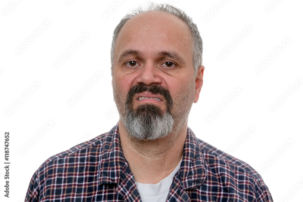 Disgusted man with beard makes face at camera Disgusted man with beard makes face at camera