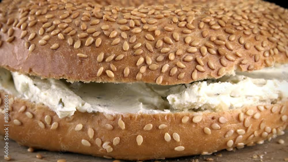 Portion of rotating Bagels with Cream Cheese as not loopable 4K UHD footage Portion of rotating Bagels with Cream Cheese as not loopable 4K UHD footage