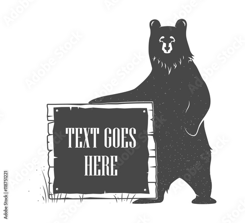 Bear holding signboard