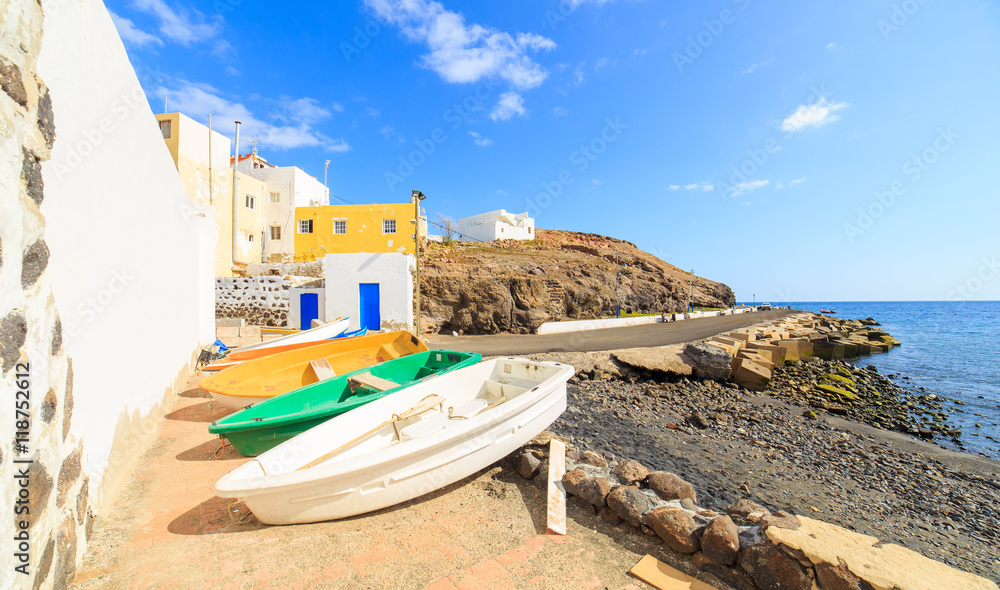 Obraz premium Wooden fishing boats in a small port in El Tarajalejo in Canary Islands
