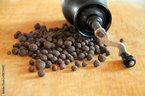 Dried peppers on wooden table photo