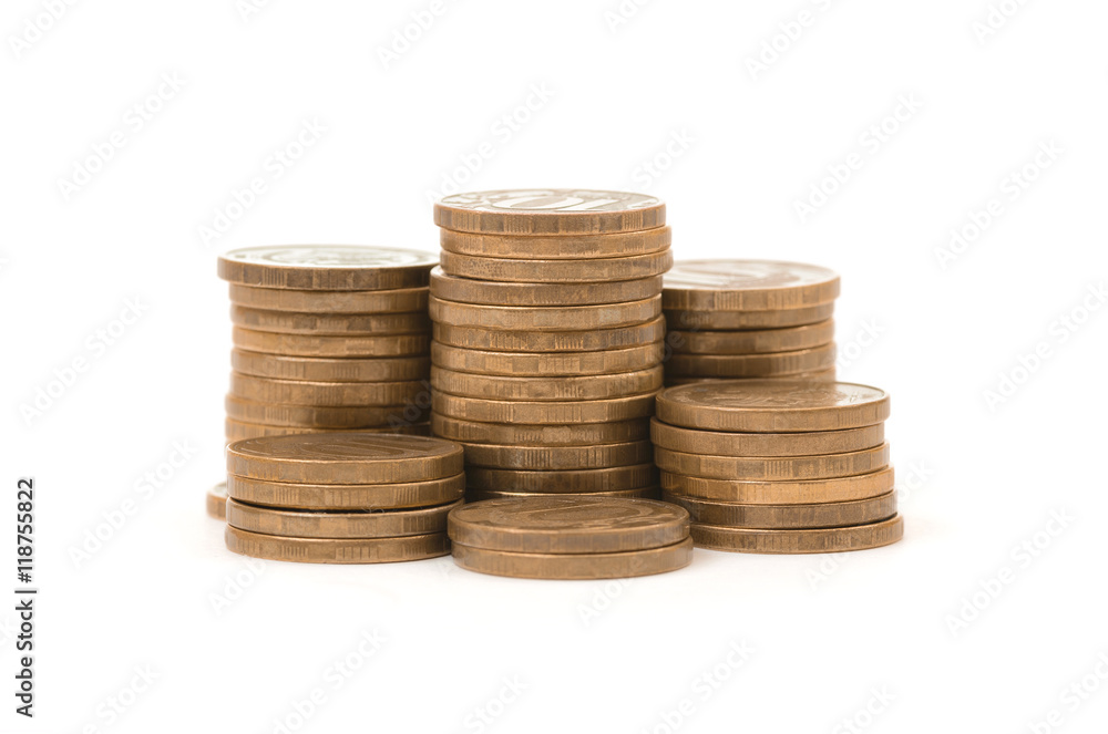 Stacks of golden coins isolated on a white background