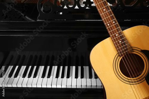 Guitar with piano  close up