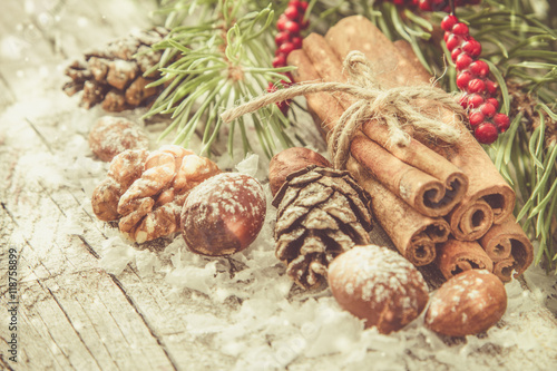 Christmas decorations on rustic wood background