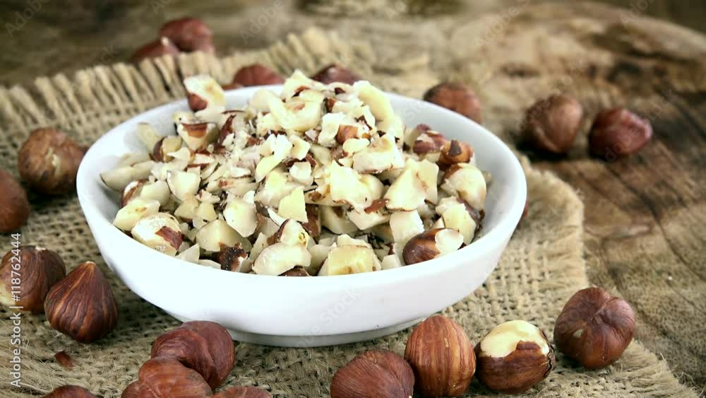 Rotating minced Hazelnuts as not loopable 4K UHD footage Rotating minced Hazelnuts as not loopable 4K UHD footage