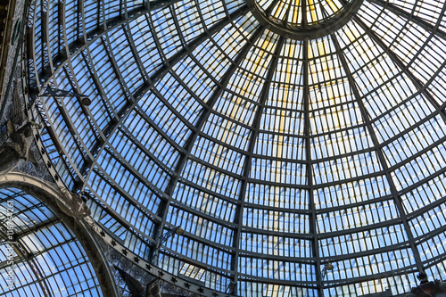 Multiple glass windows as part of domed ceiling. Horizontal form