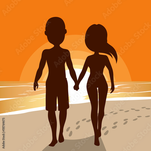 Silhouette of young couple walking on beach holding hands together with sunset background