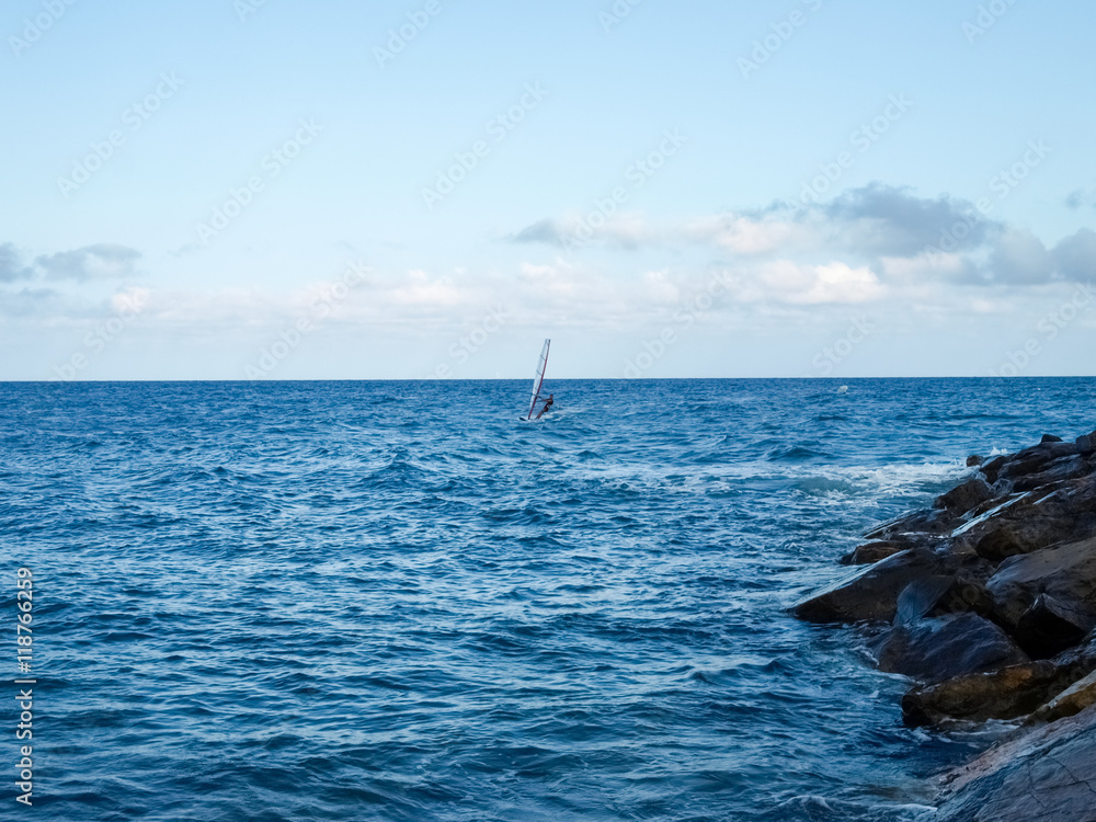 Windsurfing in the evening light Windsurfing in the evening light