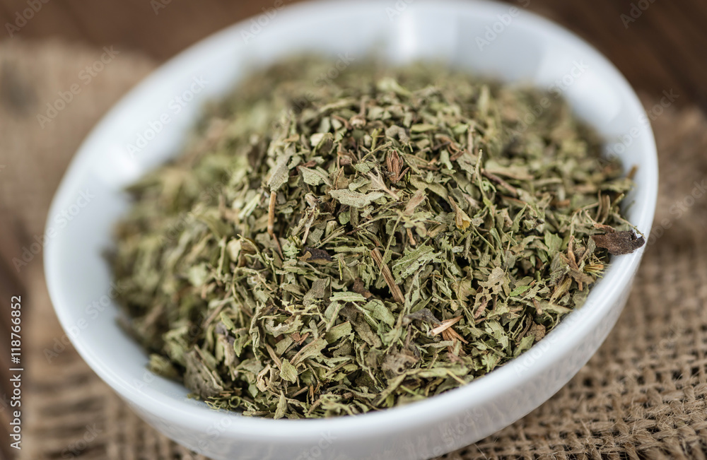 Old wooden table with dried Stevia leaves (selective focus) Old wooden table with dried Stevia leaves (selective focus)