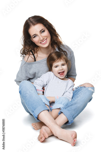 Beautiful young mother with little daughter