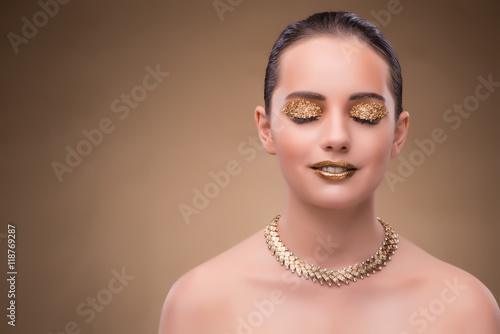 Elegant woman with jewellery in fashion concept