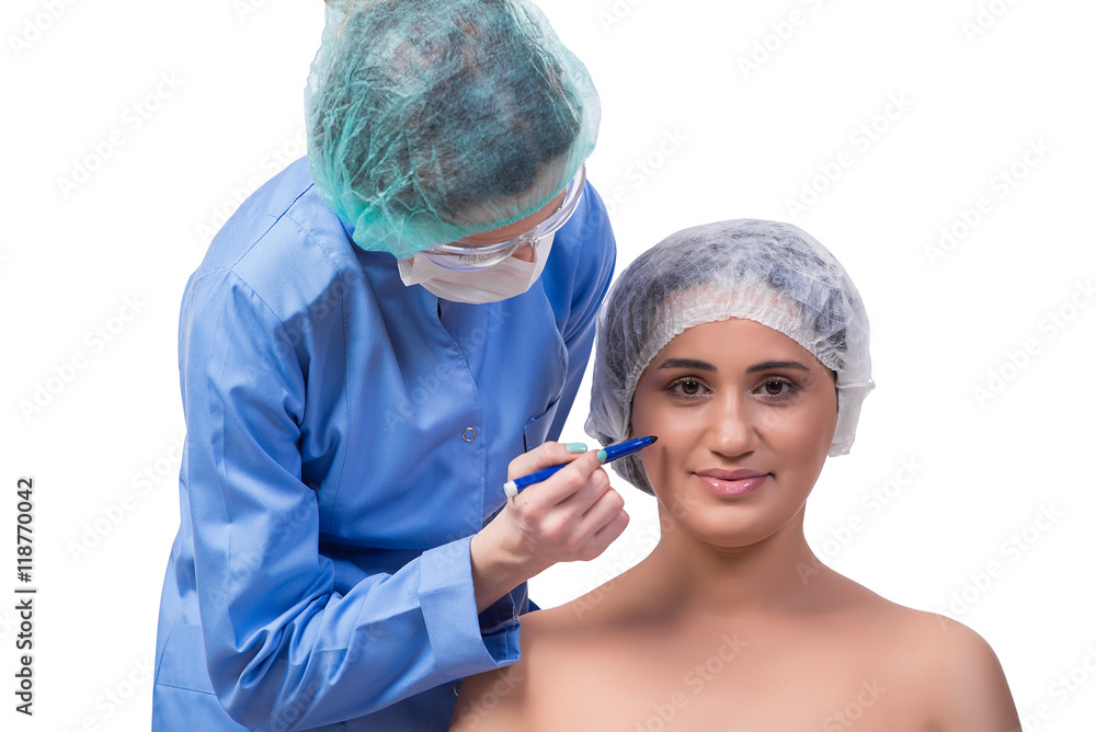Young woman preparing for plastic surgery isolated on white Young woman preparing for plastic surgery isolated on white