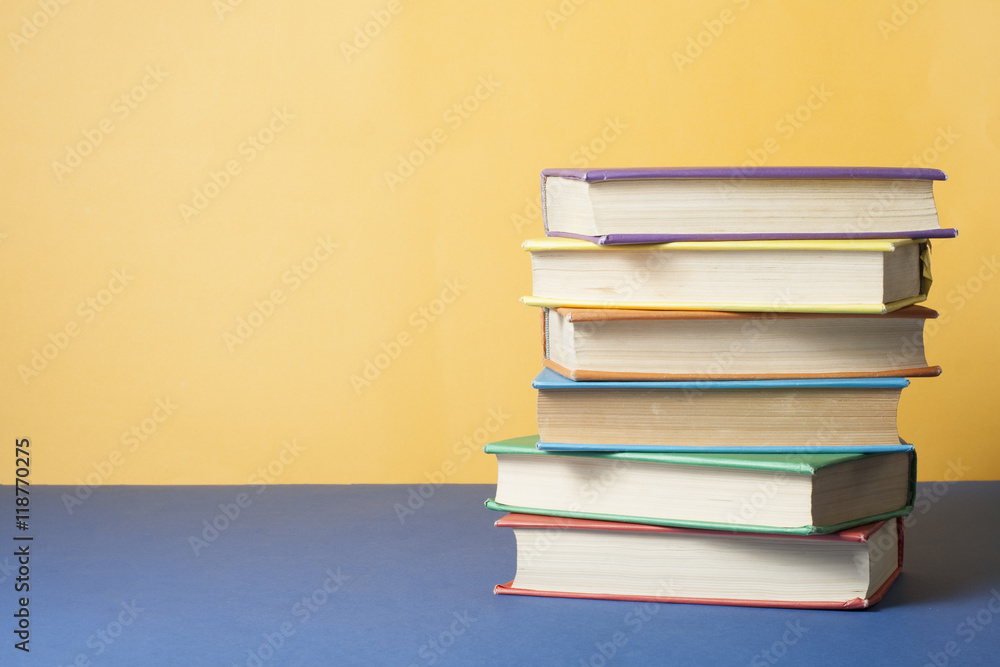 Stack of colorful books. Education background. Back to school. Copy space for text. Stack of colorful books. Education background. Back to school. Copy space for text.