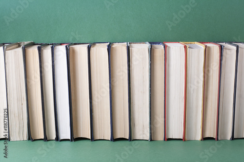 Stack of colorful books. Education background. Back to school. Copy space for text.