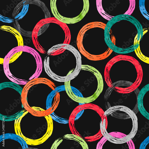 Colorful watercolor rings seamless pattern. Vector background with rainbow circle elements on dark