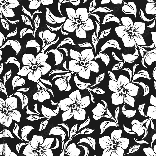 Vector seamless floral pattern with white flowers and leaves on a black background.