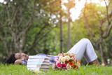 Stock Photo:.Woman with book reading in the park.