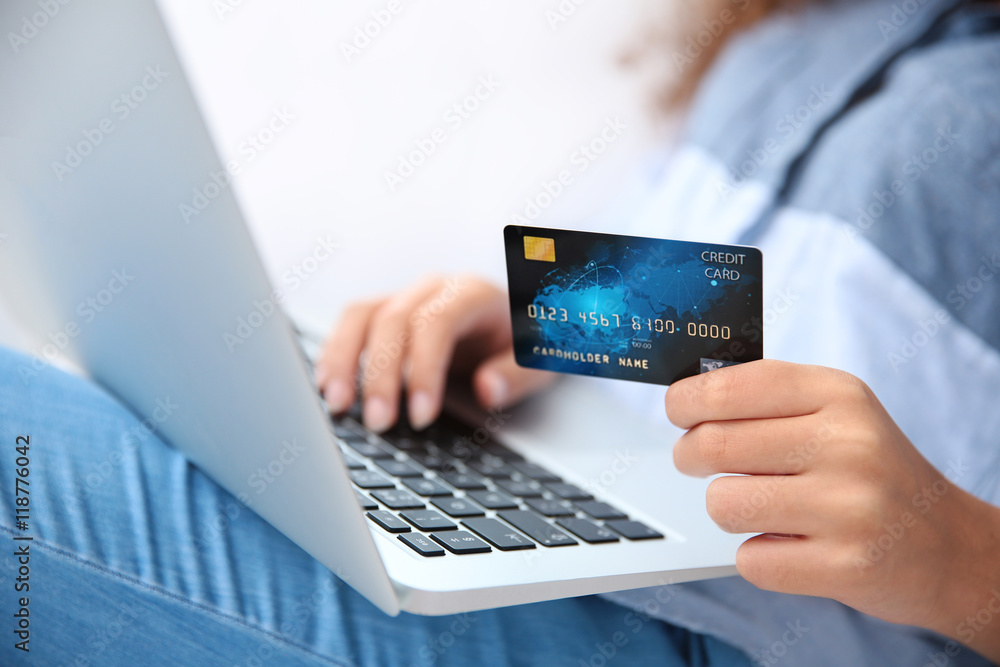 Woman hands using credit card and laptop for online shopping Woman hands using credit card and laptop for online shopping
