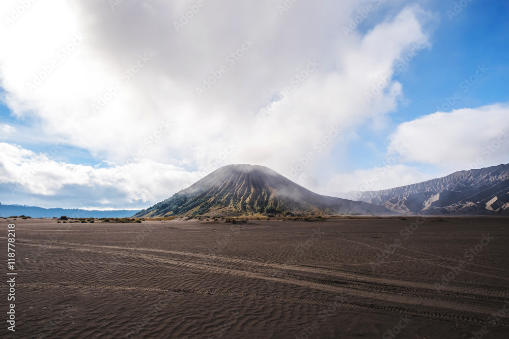 Landscape, Mount Bromo with tyre tracks, adventure concept