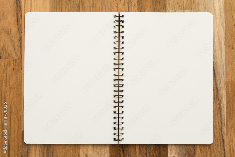 Blank empty notepad on wooden table background - Business and education concept. Blank empty notepad on wooden table background - Business and education concept.