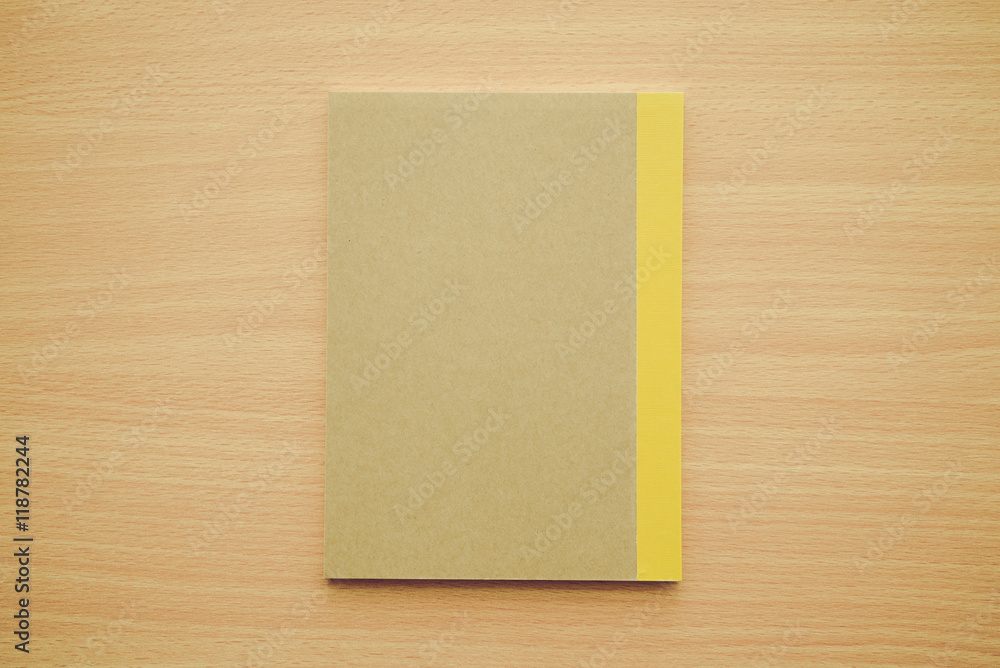 Blank empty notepad on wooden table background - Business and education concept. Blank empty notepad on wooden table background - Business and education concept.