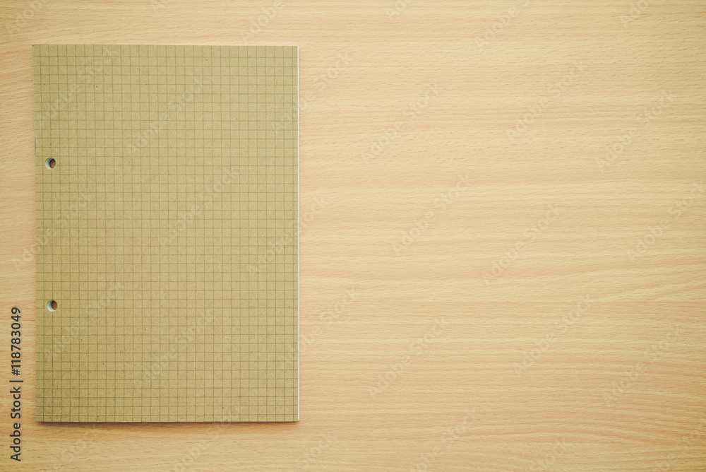 Blank empty notepad on wooden table background - Business and education concept. Blank empty notepad on wooden table background - Business and education concept.