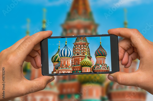 Taking photo of St. Basils cathedral in Moscow with cell phone