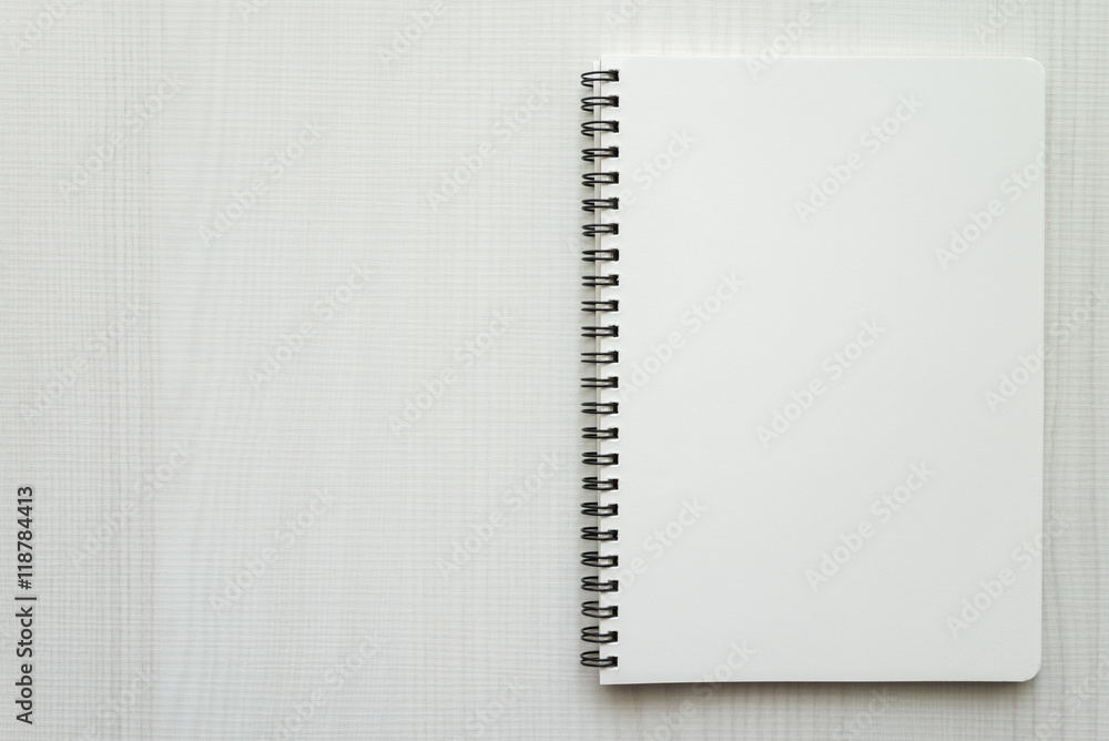 Blank empty notepad on white wooden table background - Business and education concept. Blank empty notepad on white wooden table background - Business and education concept.