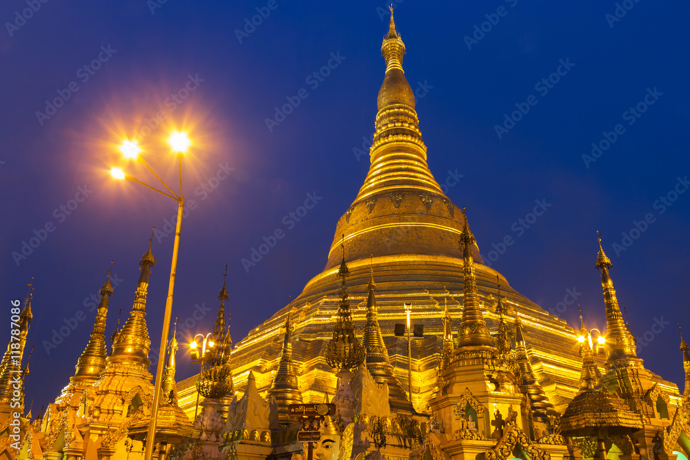 Fototapeta premium Myanmar famous sacred place and tourist attraction landmark. Shwedagon pagoda at night in Yangon, Myanmar