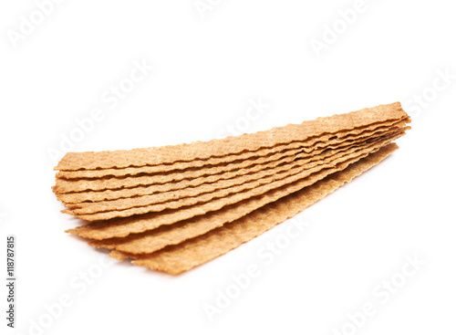 Pile of crispy bread chips isolated