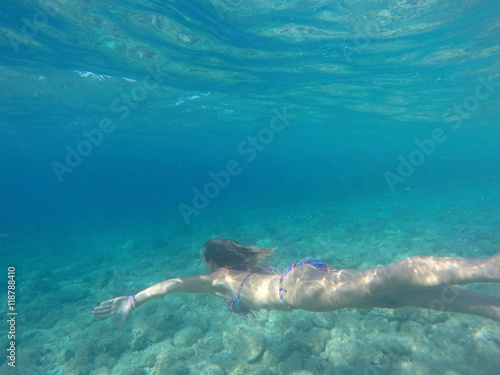 Young woman diving