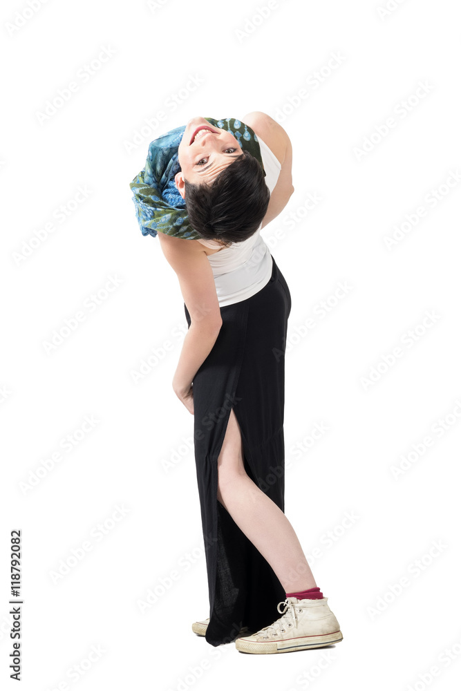 Foto Stock Awkward pose of young playful short hair woman bending backwards  and looking at camera upside down. Full body length portrait isolated over  white studio background. | Adobe Stock