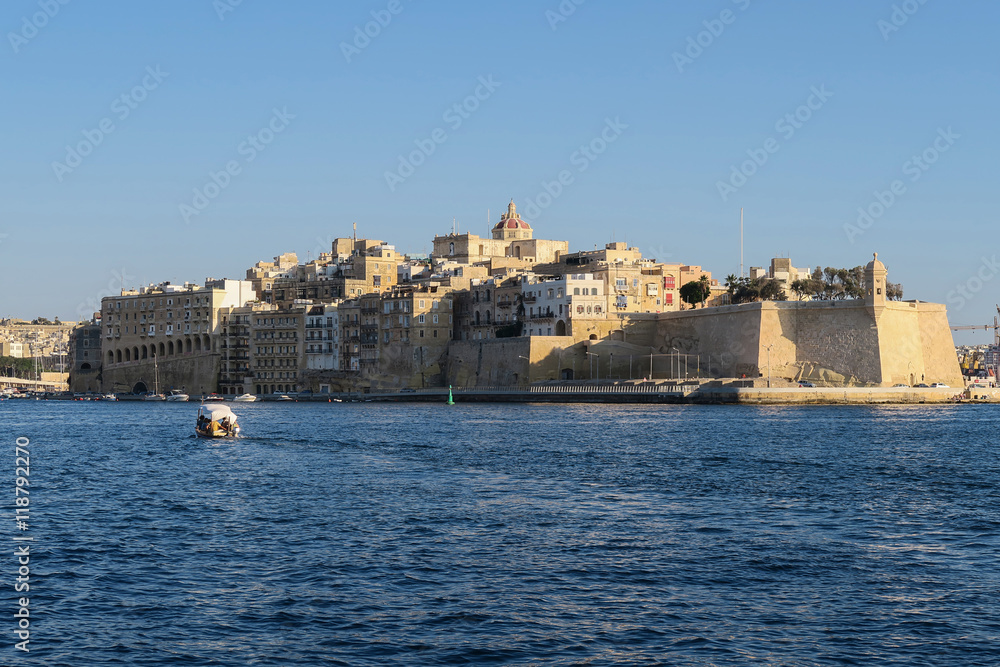 Malta, Fort Sain Angelo at Three Cities. Grand Harbour sea view from Valletta. The Three Cities are Birgu, Senglea and Conspicua. The fort is on the list of UNESCO World Heritage Sites.