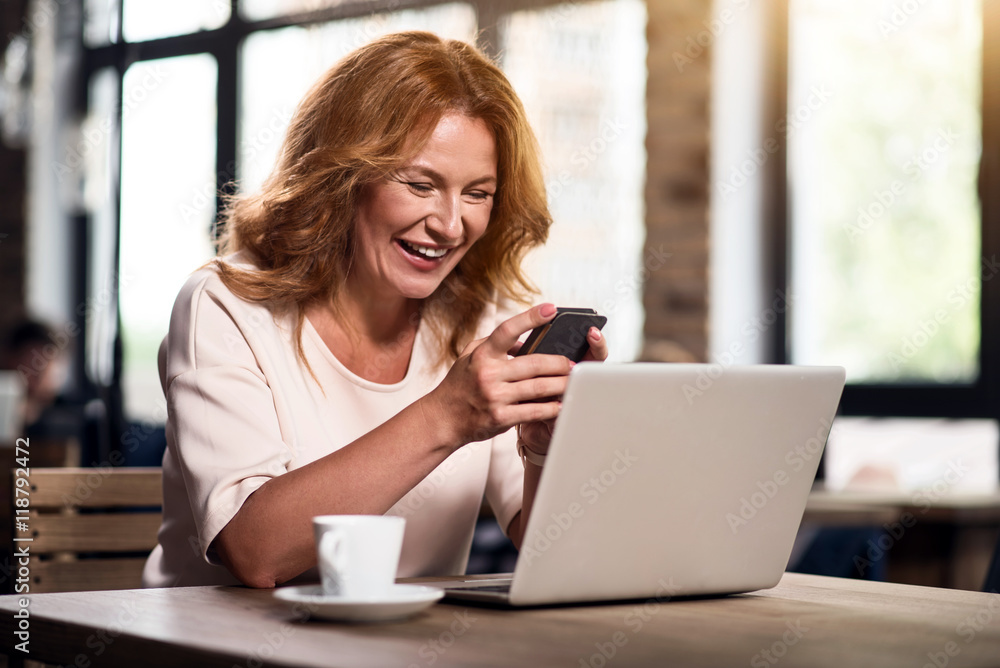 Cute woman using smart phone Cute woman using smart phone