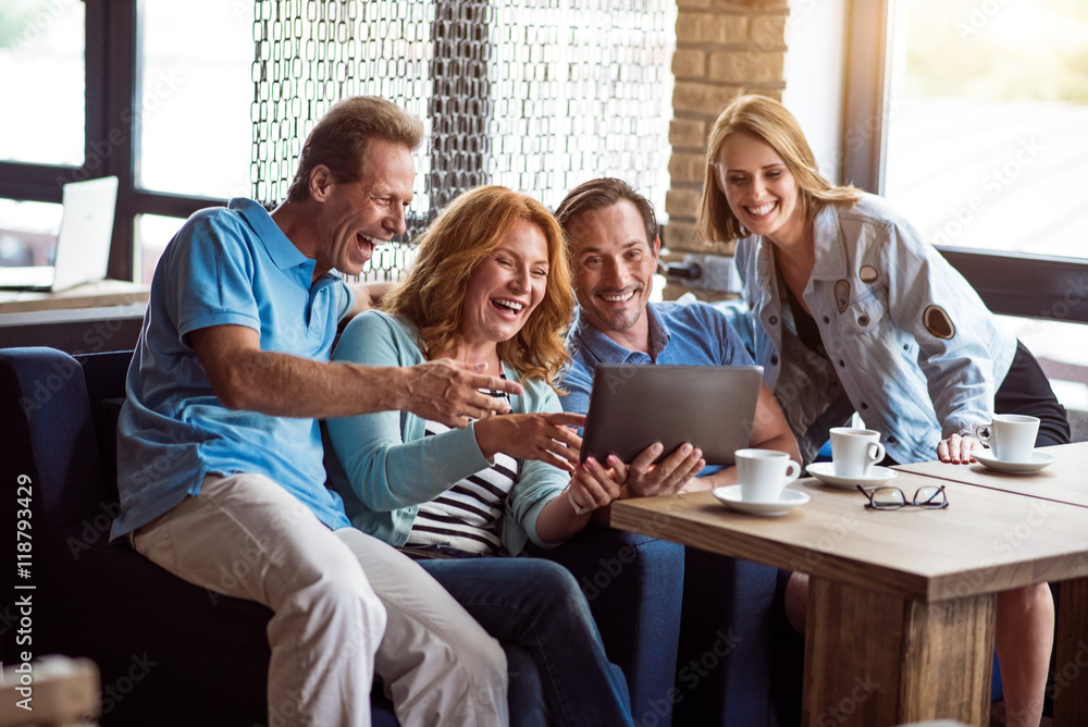 Pleasant people using digital tablet Pleasant people using digital tablet