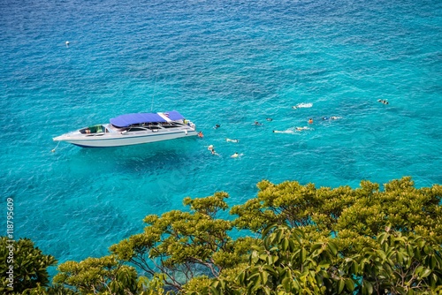 Beautiful tropical Similan island in sunny day blue sky background - Travel summer beach holiday concept.